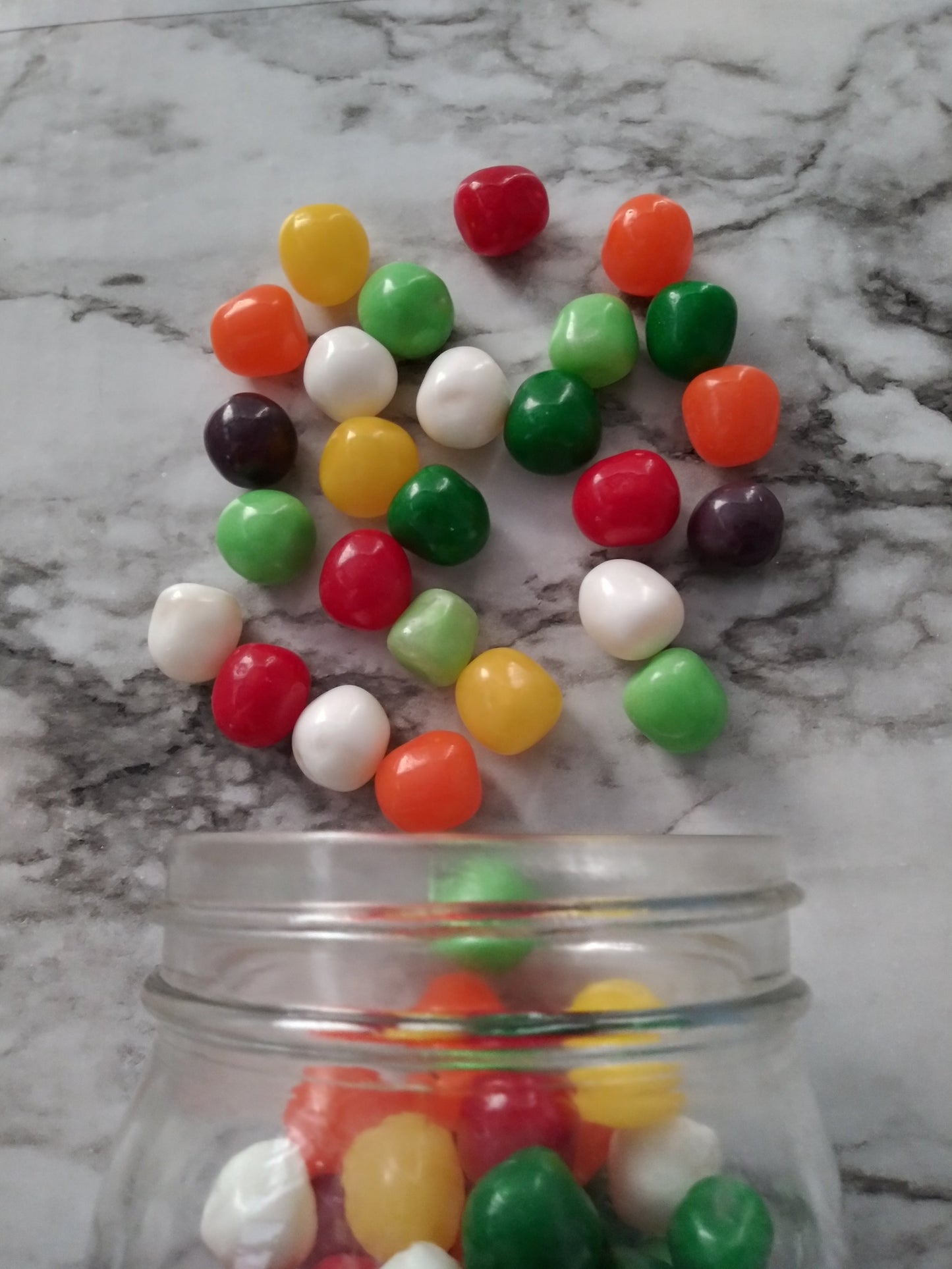 Fruit Sours 13oz. Get ready to pucker up with our Fruit Sours! These soft candy centers are coated with a sweet sugar shell, delivering a burst of fruity flavor in every bite. With exciting options like Cherry, Grape, Lemon, Orange, Grapefruit, Sour Apple, and Watermelon, thereβs a sour delight for every taste bud! $8.00 USD