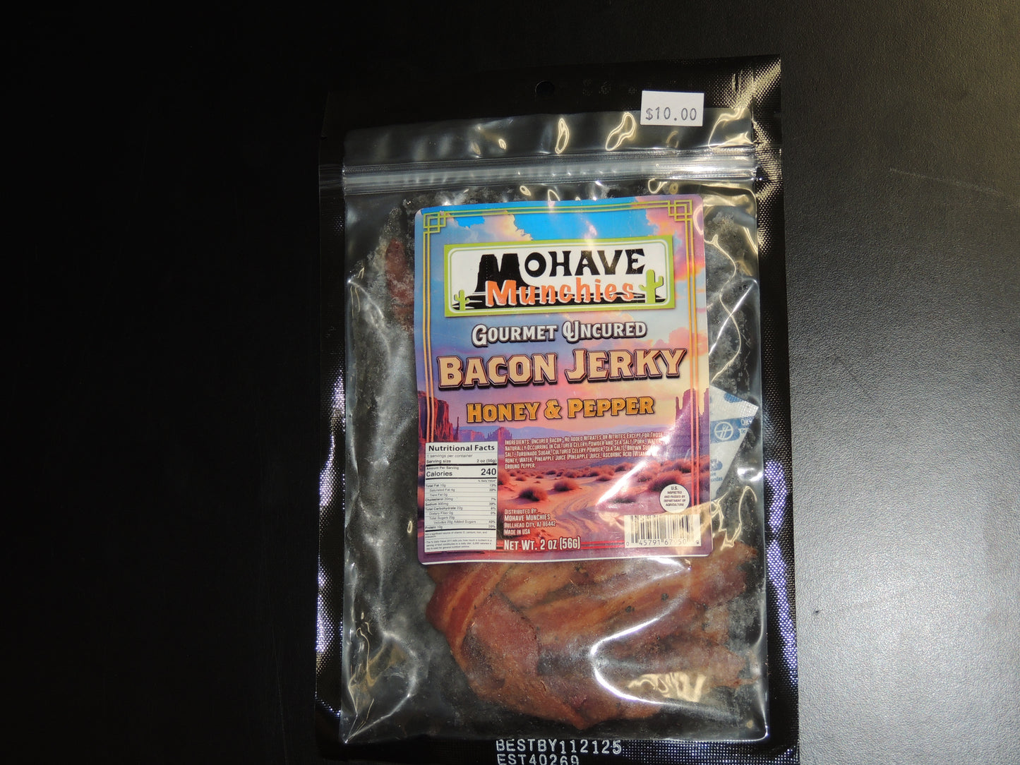 Honey & Pepper Bacon Jerky 2oz. Our Honey & Pepper Bacon Jerky delivers just that! With the natural sweetness of honey and the spicy kick of black pepper, this gluten-free jerky will satisfy all your cravings in one savory bite! $10.00 USD