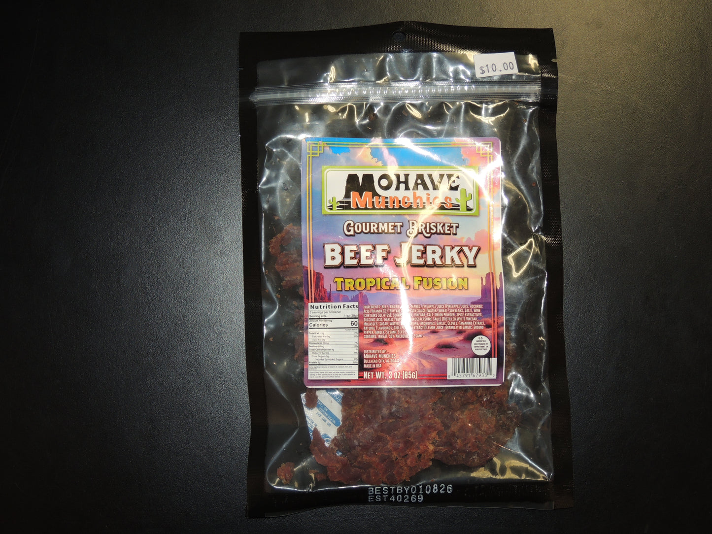 Tropical Fusion Beef Jerky 3oz. Each bite offers a delicious blend of pineapple, mango, and teriyaki, delivering a sweet, citrusy kick that transports you straight to paradise. $10.00 USD