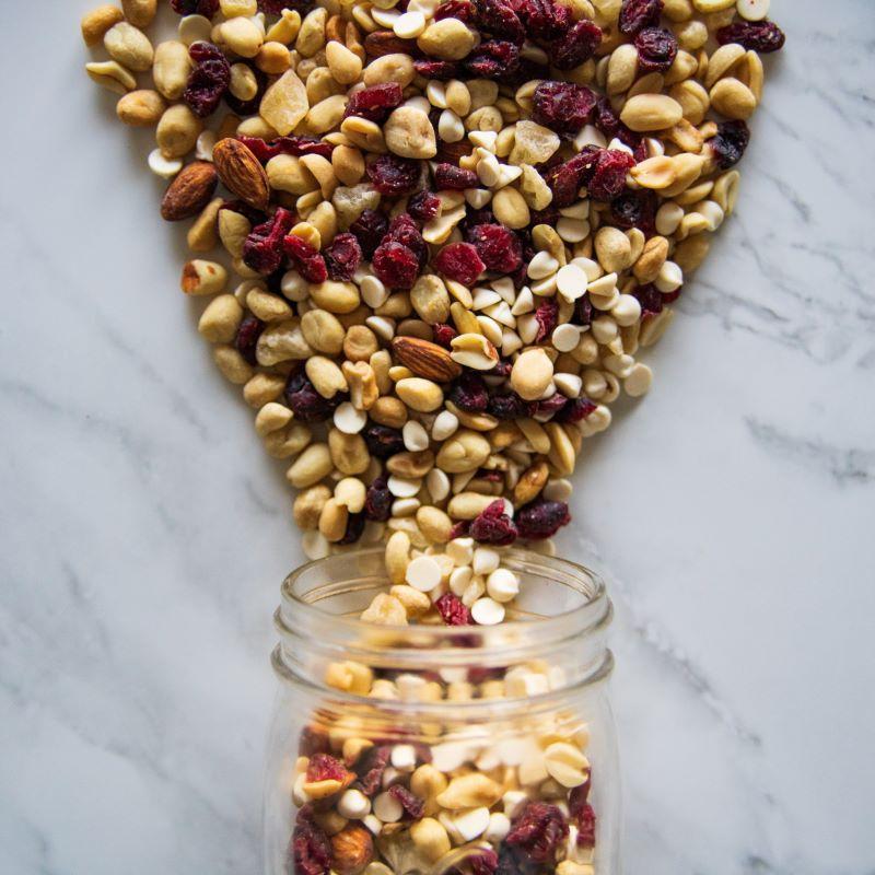 cranberry bonanza 14oz. A berry delicious blend that’s perfect for snacking! Cranberries, peanuts, almonds, cashews, diced pineapple, and creamy yogurt chips come together in a tasty, satisfying mix that’s hard to put down. $8.00 USD