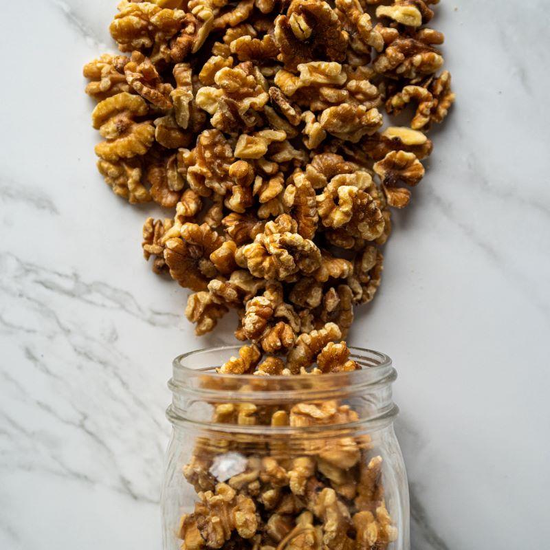 english walnuts 14oz. Straight from California, our Raw English Walnut Halves are the perfect mix of taste and nutrition! Packed with omega-3 fatty acids, they’re great for snacking or adding a boost to your baking. $8.00 USD