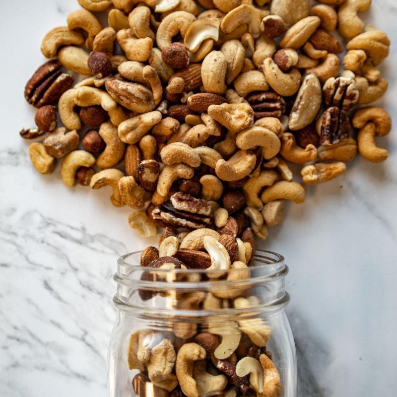 fancy mixed nuts 14oz. A delicious blend of jumbo cashews, roasted almonds, Brazil nuts, filberts, roasted pecans, and sometimes even macadamia nuts! Roasted in sunflower oil and salted to perfection for that ideal crunch. Freshly roasted in-house and delivered right to you. $1100 USD
