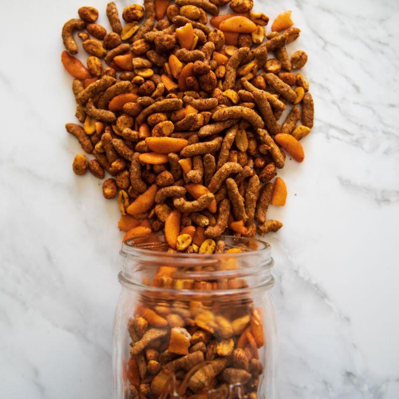 powder keg™ 14oz. A bold, flavor-packed mix of ragin’ Cajun sesame sticks, hot peanuts, cheddar sticks, and chili crackers. This explosive combination is sure to satisfy your spicy cravings! $8.00 USD