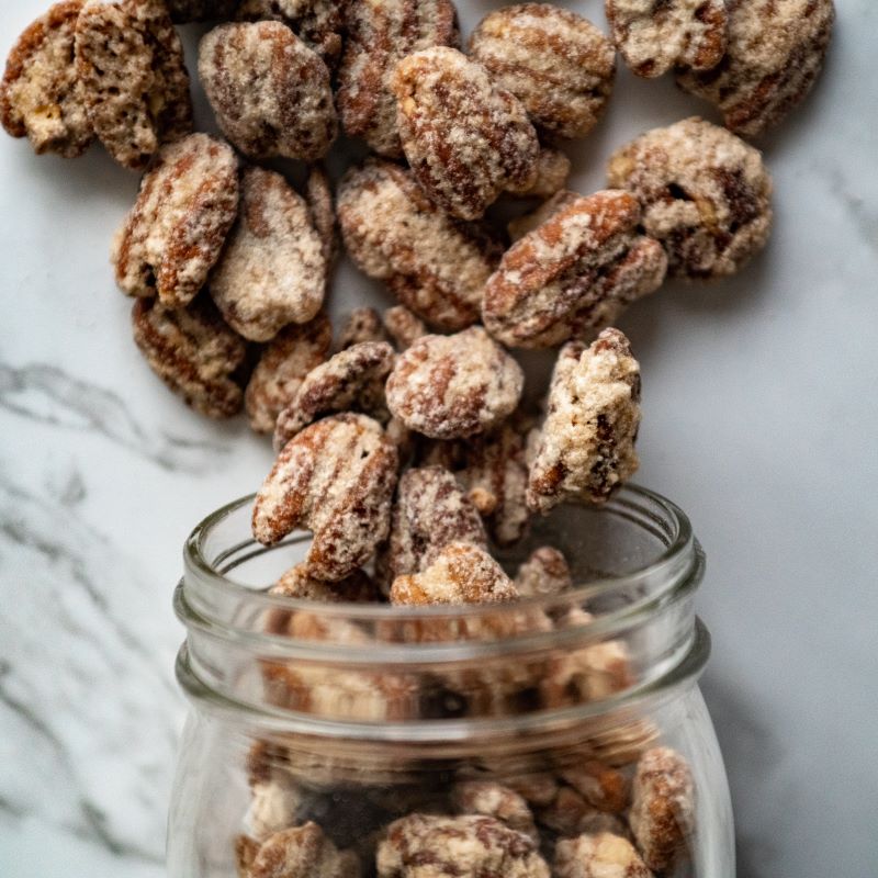 praline pecans 10 oz. Sweet, crunchy praline pecans with a rich confectionary coating of brown sugar, butter, and cream. These little bites of heaven are irresistible! $11.79 USD