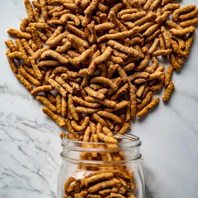 sesame sticks 13oz. Sesame sticks are a tasty treat and a crowd favorite! Crispy, oil-roasted sticks loaded with sesame seeds. Perfect for snacking or adding to your favorite trail mix. $699 USD