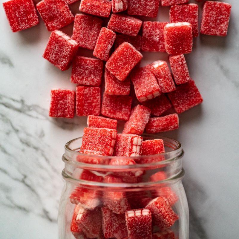 tartberry bricks 13oz. Get ready for a sweet and tangy treat! These sanded tart candies are filled with a creamy center, offering the perfect balance of tartness and smoothness in every bite. $7.00 USD