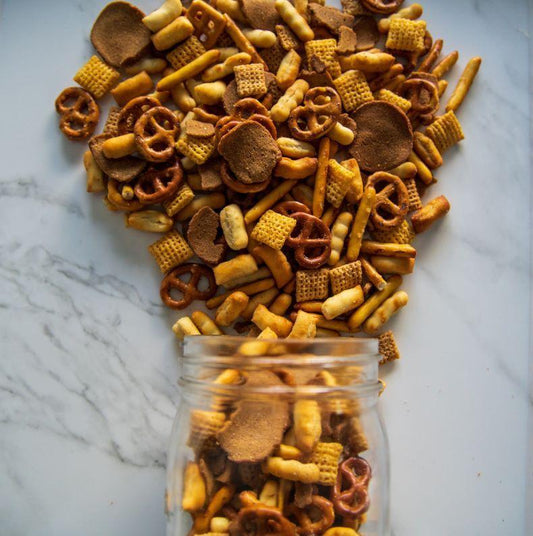Canyon Crunch 16oz. Get ready to crunch your way through a flavor-packed mix with Canyon Crunch™! This classic snack blend features garlic-flavored Chex pieces, garlic rye rounds, garlic bread chips, and garlic pretzels, all coming together for the ultimate savory experience. $800 USD