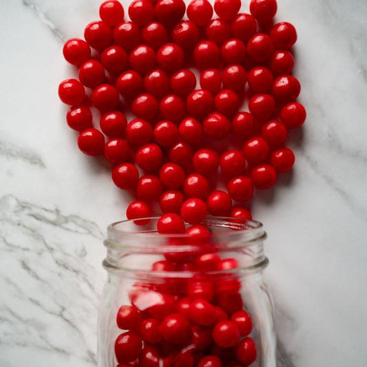 Cherry Sours 14oz. Feel the tangy kick with our Cherry Sours! These little balls of sour, cherry goodness will make your taste buds tingle with each bite. A fun, fruity treat for anyone who loves a little extra zing! $7.00 USD