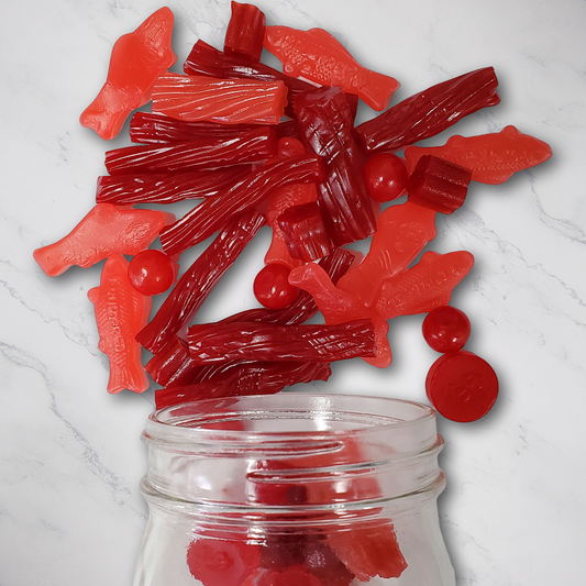 Deep in the Red 14oz. A red-hot collection of fruity favorites! Dive into this vibrant mix featuring West Coast Twists, Cherry Sours, West Coast Bites, Red Fish, Cherry Coins, Strawberry Bites, Watermelon Bites, and Cherry Bites. It’s a berry good time all in one bag! $6.00 USD