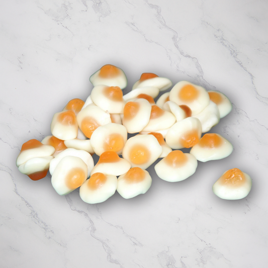 Gummy Fried Eggs 13oz. Who says you can’t have eggs for dessert? These soft, marshmallow-like gummy fried eggs are packed with a sweet peach cream soda flavor that will make you want to devour the whole bag!  $7.79 USD
