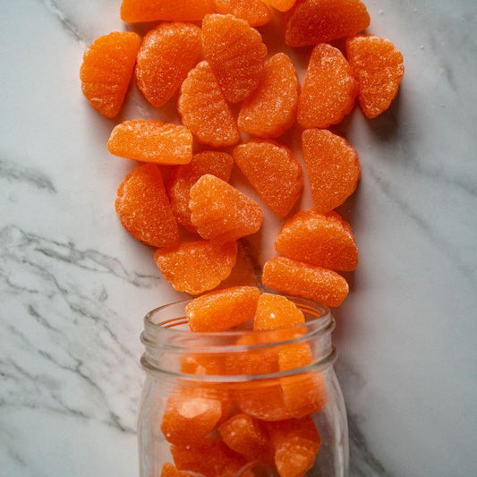 Orange Slices 16oz. Sweet, sugar-sanded jelly candies bursting with vibrant orange flavor! These soft, chewy slices are a tangy treat that will brighten your day with every bite. $5.00 USD