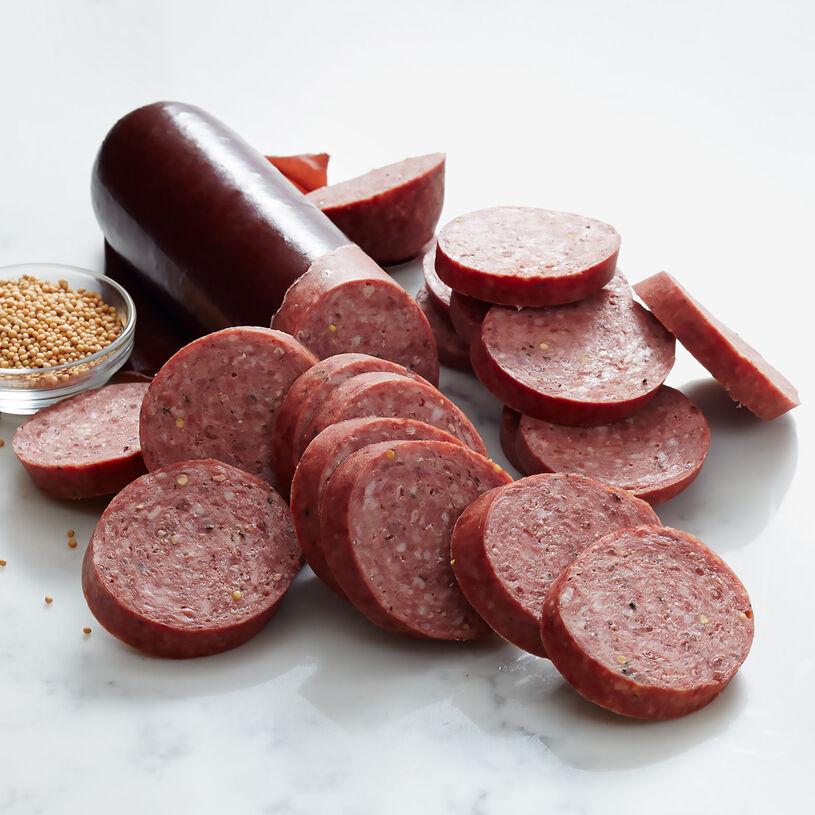 Summer Sausage -10 oz. Savor the rich, smoky flavor of our delicious beef and pork summer sausage. Naturally wood smoked for that perfect touch of savory goodness. Whether you’re snacking or serving at a gathering, this sausage is sure to be a hit! $8.29 USD 