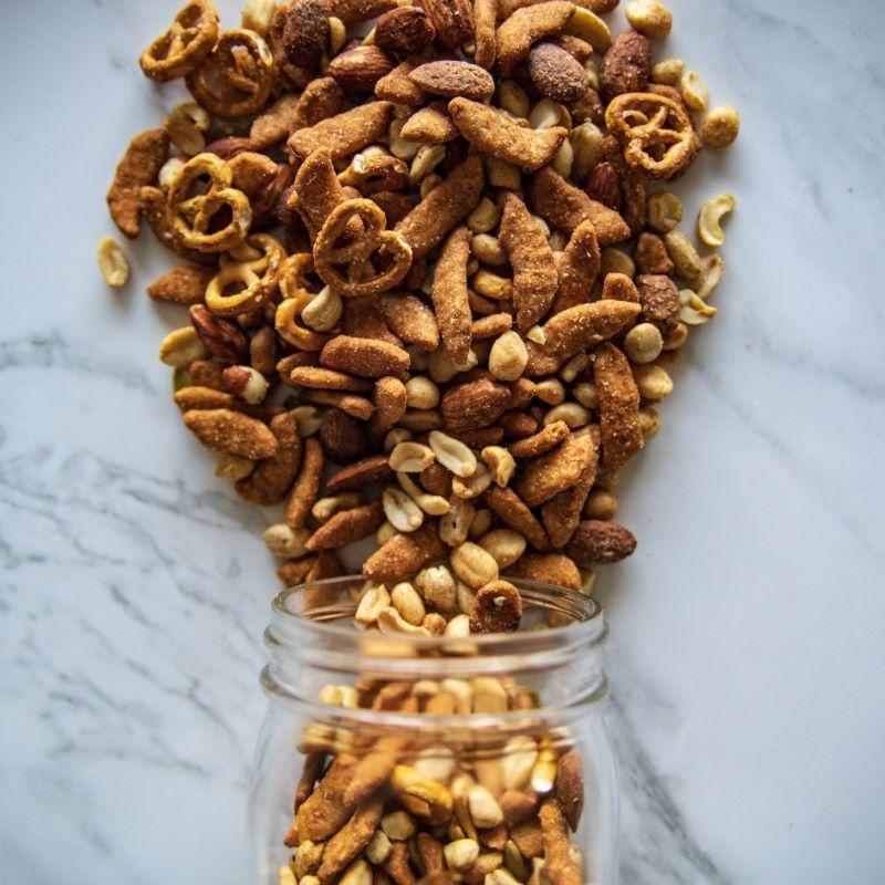 Baja Party Mix 14oz. Start a party in your mouth with this irresistible mix! Packed with cashew pieces, roasted Virginia peanuts, wasabi almonds, wasabi peanuts, roasted pumpkin seeds, zesty sesame sticks, and pretzel balls, it’s the ultimate blend to satisfy all your crunchy cravings. $8.00 USD