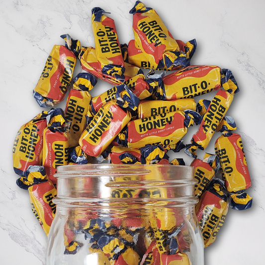 Bit O’Honey® 14oz.

Enjoy the&nbsp;classic combination of chewy taffy and a touch of honey with Bit O’Honey®. These timeless treats are the perfect balance of smooth sweetness and a satisfying chew, making them a delightful snack for any occasion. $8.00 USD