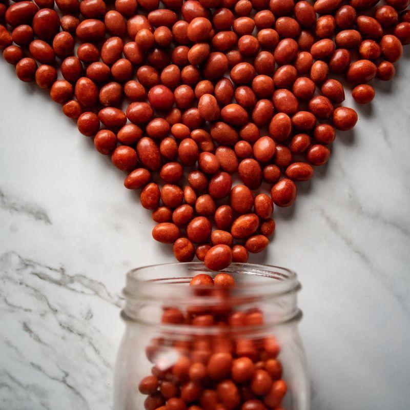 boston baked beans 14oz. These crunchy, candy-coated peanuts are a nostalgic treat! With a hard candy shell that gives way to a roasted peanut inside, they’re the perfect mix of sweet and savory. A fun, classic snack! $7.00 USD