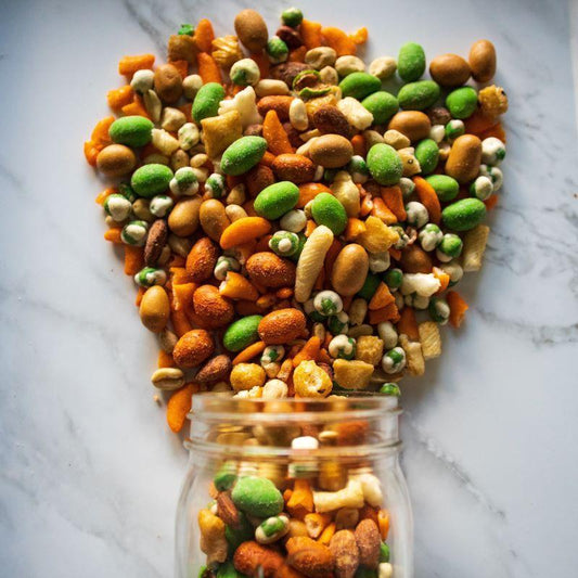 fuji fire™ 14oz. Proceed with caution, because Fuji Fire™ is not for the faint of heart! This spicy mix is packed with wasabi soy nuts, wasabi peanuts, wasabi almonds, wasabi peas, and a variety of Cajun crunch peanuts, tamari peanuts, and rice crackers that will set your taste buds on fire! If you’re looking for an intense heat experience, this mix will definitely deliver! $7.00 USD