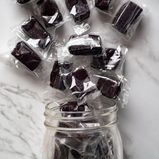 gourmet black licorice caramels 13oz. Indulge in the perfect blend of old-fashioned caramel and bold licorice flavor! Made with lots of butter and cream, these chewy caramels offer a smooth, rich texture with a deep, satisfying taste. $11.79 USD