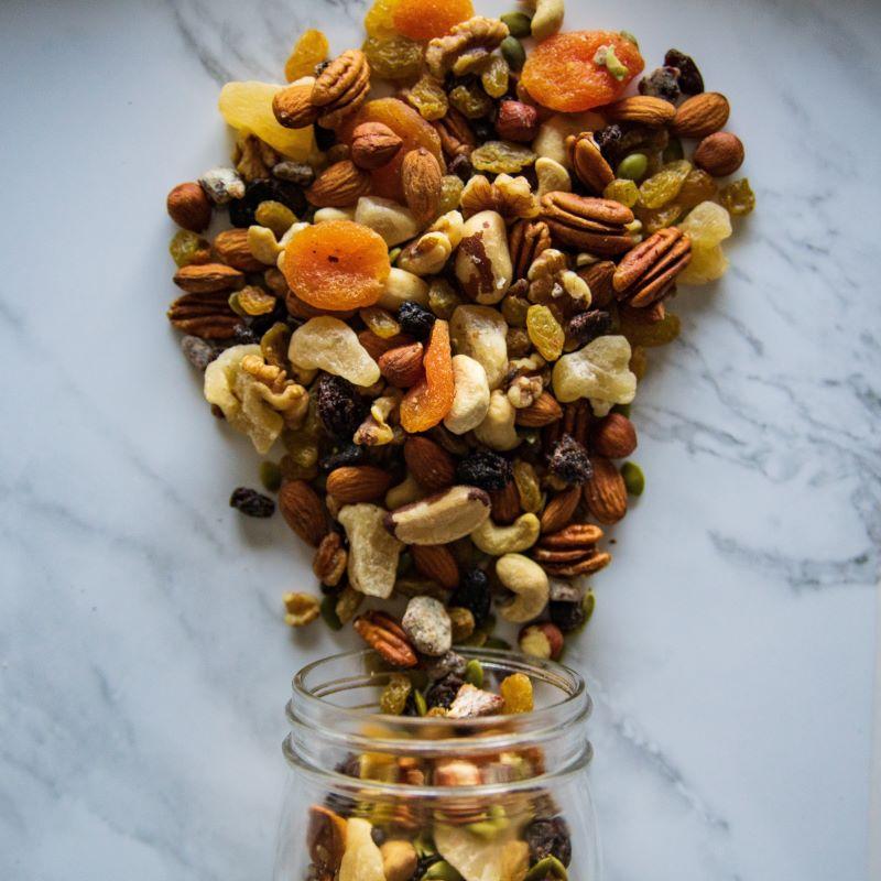 mountain jubilee® 14oz. A delicious all-natural trail mix with a sweet blend of raisins, pineapple tidbits, apricots, almonds, diced dates, walnuts, pecans, Brazil nuts, hazelnuts, cashews, and raw pumpkin seeds. No added sugars, just pure natural goodness! $9.00 USD