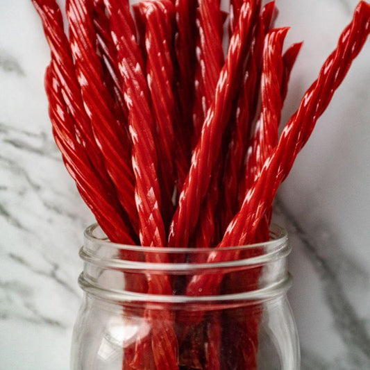 red  twists 14oz. These delicious strawberry-flavored red twists are a perfect blend of sweet and fruity goodness, making them the ultimate snack for any twist lover! $6.00 USD