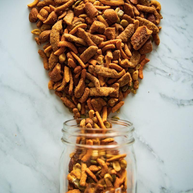santa fe sizzle™ 16oz. Get ready for a flavor explosion! This top-selling trail mix combines the perfect blend of spicy, savory, and crunchy. Packed with nacho corn sticks, BBQ sticks, jalapeno pretzels, hot peanuts, and pumpkin seeds—all seasoned with our signature pub mix seasoning. It’s a taste you won’t forget! $8.00