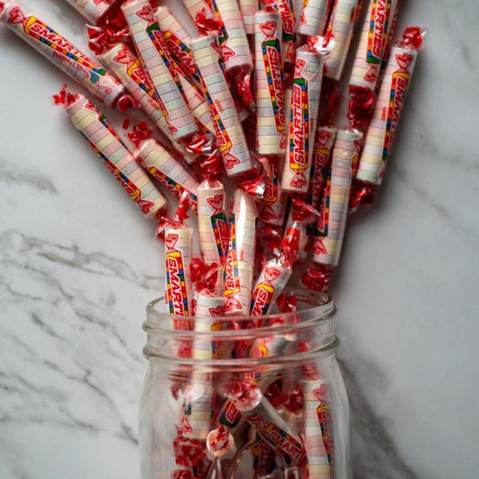 smarties® 13 oz. A nostalgic favorite! Enjoy 50 rolls of these sweet and tangy little tablet candies that everyone knows and loves. Whether you’re sharing with friends or enjoying them all to yourself, Smarties® bring a burst of fun with every roll! $6.00 USD