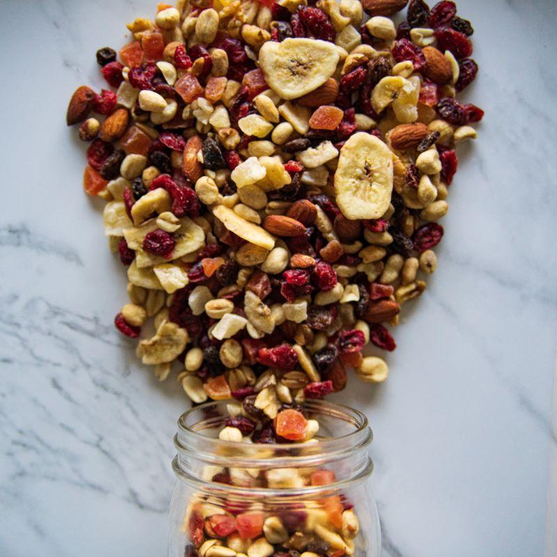sunshine mix™ 14oz. Start your day with a burst of flavor! This mix combines walnuts, almonds, peanuts, sunflower seeds, cranberries, cherry-infused cranberries, dark raisins, banana chips, pineapple, and papaya – a perfect balance of sweet and nutty! $7.99 USD